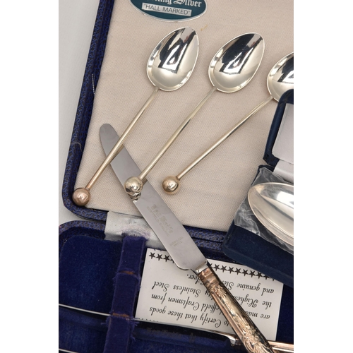 500 - AN ASSORTMENT OF SILVER CUTLERY, to include a cased set of six silver handled tea forks and a matchi... 