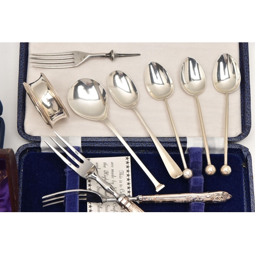 500 - AN ASSORTMENT OF SILVER CUTLERY, to include a cased set of six silver handled tea forks and a matchi... 