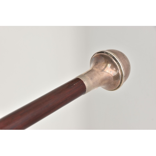 502 - A SILVER MOUNTED WALKING STICK, a wooden walking stick fitted with a silver pommel, hallmarked 'W I ... 