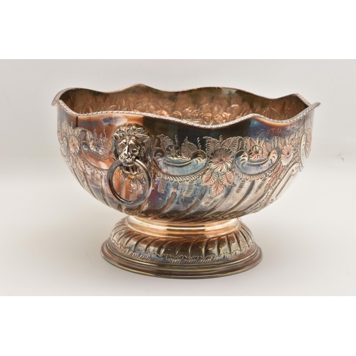 506 - A WHITE METAL PUNCH BOWL, raised on a circular base, embossed gadrooned and floral detail, approxima... 