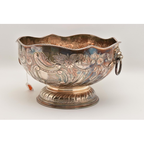 506 - A WHITE METAL PUNCH BOWL, raised on a circular base, embossed gadrooned and floral detail, approxima... 