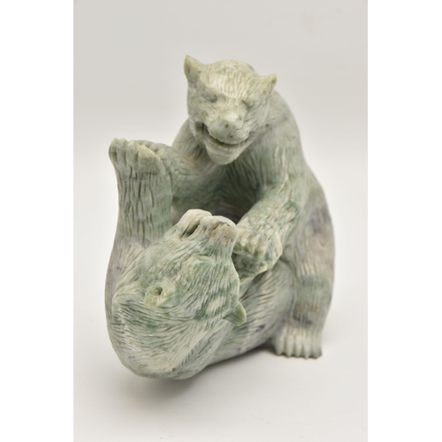 509 - A CARVED JADIETE ORNAMENT, two fighting bears, approximate width 175mm x height 145mm, (condition re... 