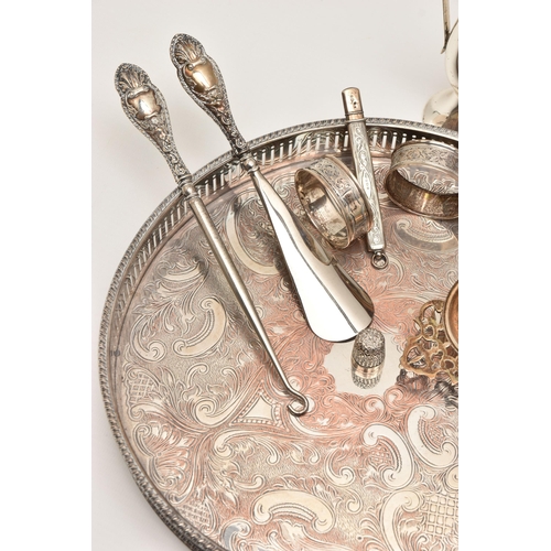 510 - A BOX OF ASSORTED SILVER AND WHITE METAL ITEMS, to include two foliate pattern napkin rings both hal... 