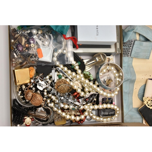 520 - A BOX OF ASSORTED COSTUME JEWELLERY AND ITEMS, to include a gold tone 'Monet' floral brooch, chains,... 