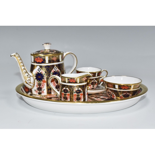 755 - A ROYAL CROWN DERBY IMARI PATTERN 1128 ORNAMENTAL MINIATURE TEA SERVICE comprising a tray, a teapot,... 