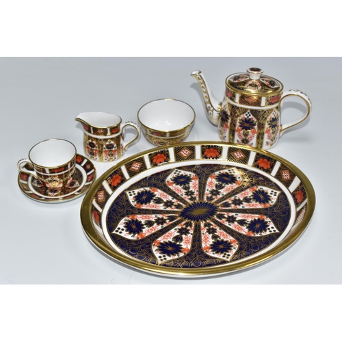 755 - A ROYAL CROWN DERBY IMARI PATTERN 1128 ORNAMENTAL MINIATURE TEA SERVICE comprising a tray, a teapot,... 