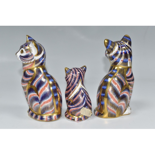 758 - A GROUP OF THREE ROYAL CROWN DERBY PAPERWEIGHTS comprising two 'Cats,' one with a fixed ceramic back... 