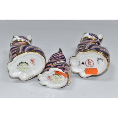 758 - A GROUP OF THREE ROYAL CROWN DERBY PAPERWEIGHTS comprising two 'Cats,' one with a fixed ceramic back... 