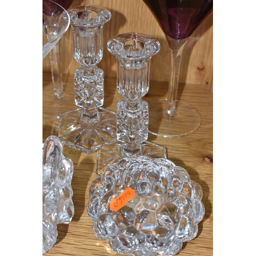 761 - A GROUP OF NINE CRYSTAL GLASS DECORATIVE ITEMS to include a pair of Waterford purple martini glasses... 