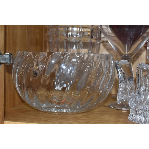 761 - A GROUP OF NINE CRYSTAL GLASS DECORATIVE ITEMS to include a pair of Waterford purple martini glasses... 