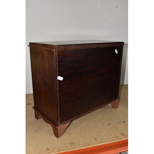 765 - A SAMPLE/APPRENTICE CHEST OF DRAWERS with three drawers decorated with a lighter wood band, each wit... 