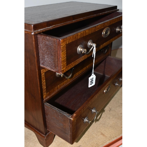 765 - A SAMPLE/APPRENTICE CHEST OF DRAWERS with three drawers decorated with a lighter wood band, each wit... 