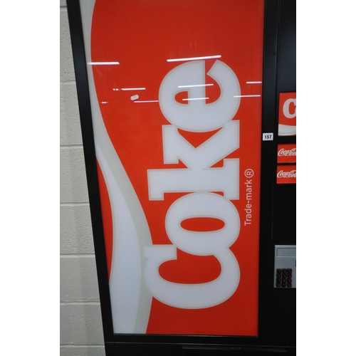 157 - A LARGE ELECTRIC COCA-COLA ADVERTISING SIGN, mimicking the front of a vending machine, on castors, w... 