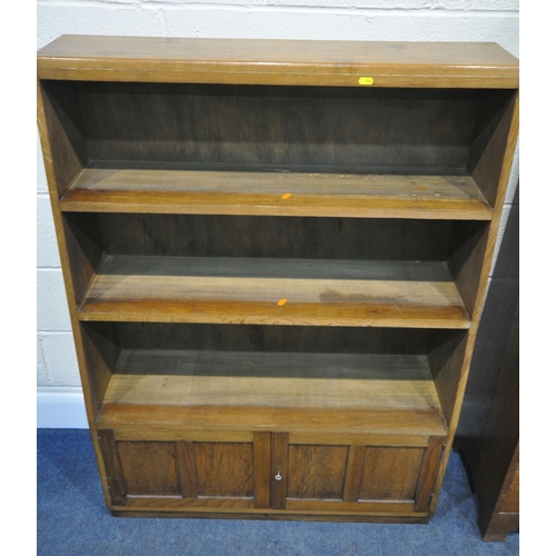 161 - A 20TH CENTURY OAK CABINET, with a detachable glass hide and fall door, atop a base with a fall fron... 