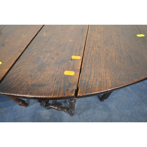 166 - A GEORGIAN OAK OVAL GATE LEG TABLE, open width 104cm x closed width 39cm x depth 82cm x height 73cm,... 