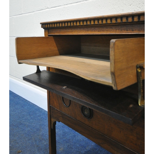 169 - A 20TH CENTURY OAK MUSIC CABINET, with three fall front drawers, width 54cm x depth 38cm x height 68... 