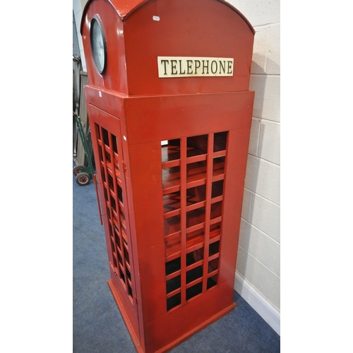 170 - A SCRATCH BUILT RED PAINTED METAL TELEPHONE BOX, the domed top with a clock to the front, the single... 