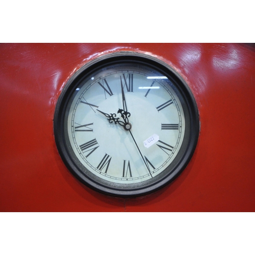 170 - A SCRATCH BUILT RED PAINTED METAL TELEPHONE BOX, the domed top with a clock to the front, the single... 