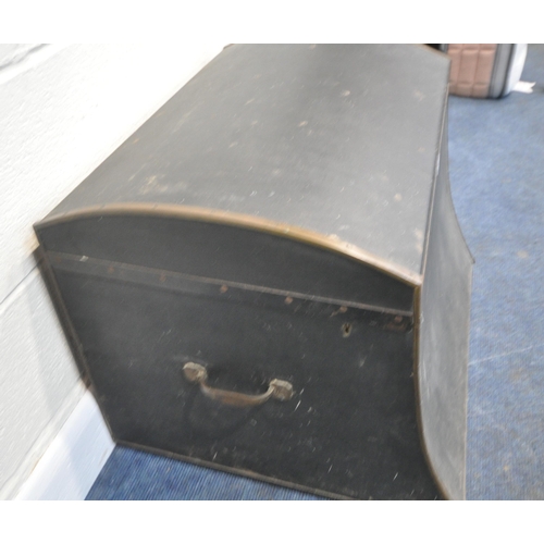 181 - A 20TH CENTURY TRAVELLING TRUNK, with a domed lid, twin metal handles, and a shaped front, width 70c... 