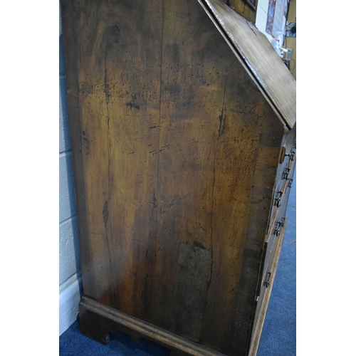 184 - A QUEEN ANNE (CIRCA 1710) FIGURED WALNUT DOUBLE DOME TOP BUREAU BOOKCASE, the double bevelled edge m... 