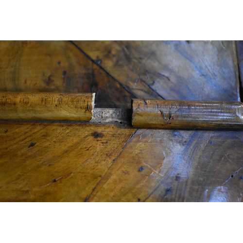 184 - A QUEEN ANNE (CIRCA 1710) FIGURED WALNUT DOUBLE DOME TOP BUREAU BOOKCASE, the double bevelled edge m... 