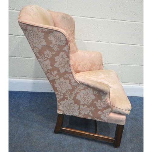 186 - A GEORGIAN WING BACK ARMCHAIR, with pink floral upholstery, width 72cm x depth 78cm x height 95cm, c... 