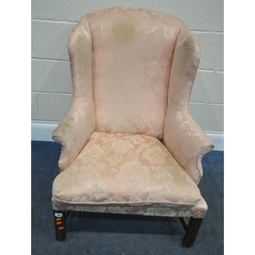 186 - A GEORGIAN WING BACK ARMCHAIR, with pink floral upholstery, width 72cm x depth 78cm x height 95cm, c... 