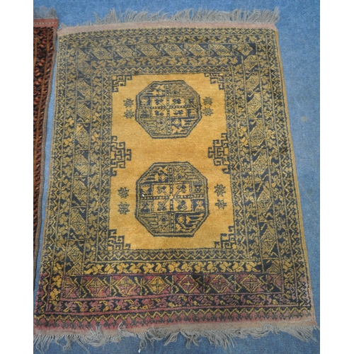 191 - AN AFGHAN GOLD GROUND RUG, with two central medallions, surrounded by a multi-strap border, 121cm x ... 