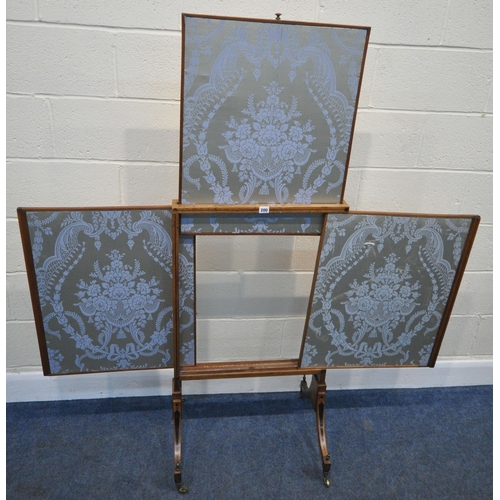 200 - A REGENCY WALNUT FIRE SCREEN, with two sliding screens, and a rise and fall screen, raised on shaped... 