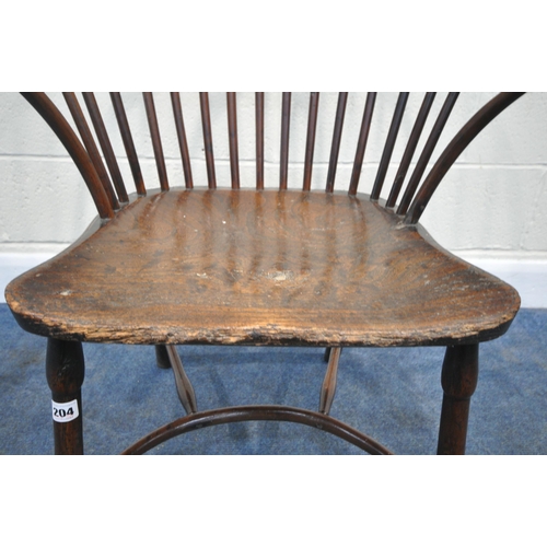 204 - A YEW WOOD WINDSOR HOOP BACK CHAIR, the spindles terminate to shaped armrests, an elm dished seat, r... 