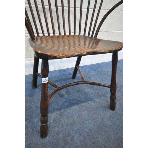 204 - A YEW WOOD WINDSOR HOOP BACK CHAIR, the spindles terminate to shaped armrests, an elm dished seat, r... 