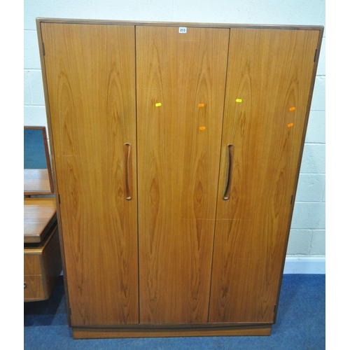 213 - G PLAN, A MID CENTURY TEAK FOUR PIECE BEDROOM SUITE, comprising a wardrobe, with one single door and... 