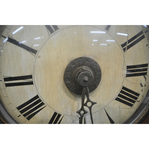 215 - A 19TH CENTURY POSTMAN'S CLOCK, with a glass convex door, thats enclosing a 8.5 inch dial, depictin... 