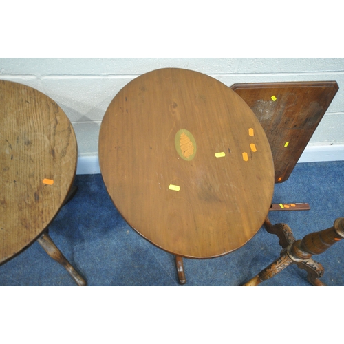 222 - FOUR TILT TOP TRIPOD TABLES, one with a dish top, diameter 58cm x height 68cm, the oval table with a... 