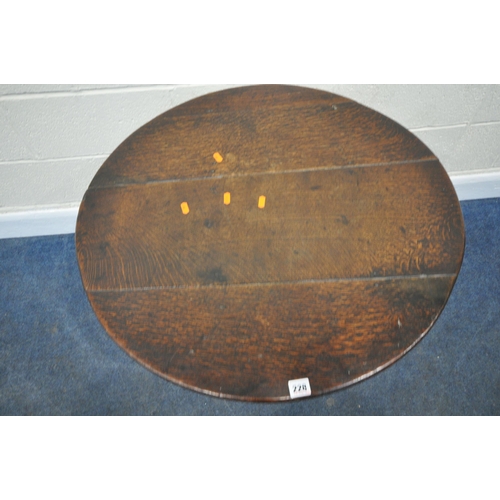 228 - A GEORGIAN OAK TILT TOP TRIPOD TABLE, the circular top raised on a cylindrical tapered support, with... 