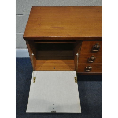 230 - A G PLAN MID CENTURY TEAK SIDEBOARD, fitted with double cupboard doors, three drawers, and a fall fr... 