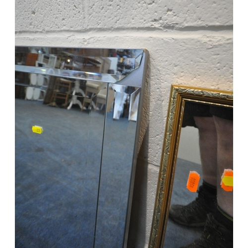 235 - A REPRODUCTION WALL MIRROR, with a broken arch pediment, 47cm x 54cm, four other wall mirrors, a tab... 