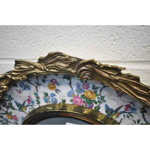 238 - A BURLEIGH WARE WALL MIRROR, with a metal outer ring, the ceramic dish with floral and bird details,... 