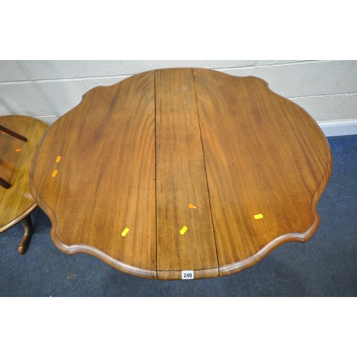 240 - AN EARLY 20TH CENTURY SUTHERLAND TABLE, with a wavy edge, raised on turned legs, with castors, open ... 