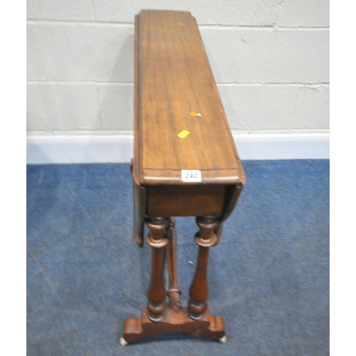 240 - AN EARLY 20TH CENTURY SUTHERLAND TABLE, with a wavy edge, raised on turned legs, with castors, open ... 