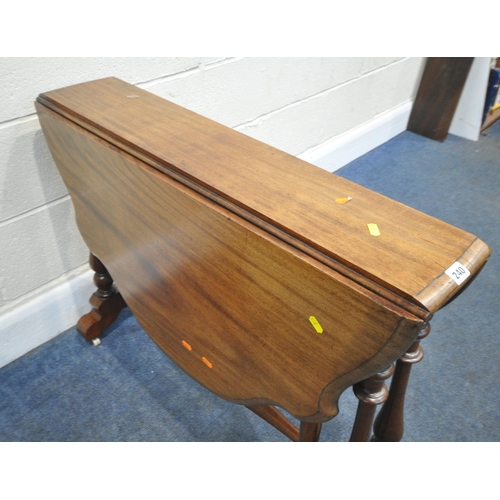 240 - AN EARLY 20TH CENTURY SUTHERLAND TABLE, with a wavy edge, raised on turned legs, with castors, open ... 