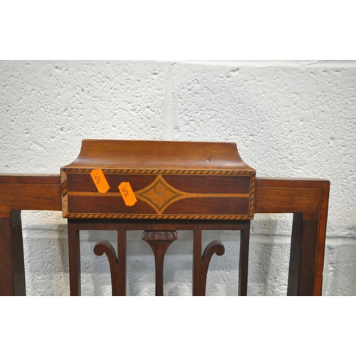 243 - A SET OF FOUR EDWARDIAN MAHOGANY CHAIRS, the backrests with scrolled designs, stripped drop in seat ... 