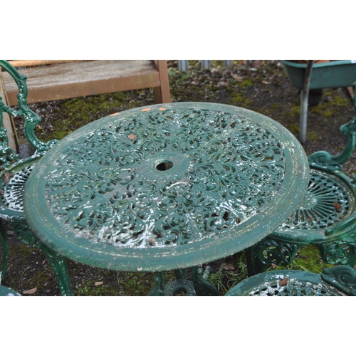 4 - A CAST ALUMINIUM GARDEN TABLE AND FOUR SIMILAR CHAIRS, all overpainted in green, pierced fretwork to... 