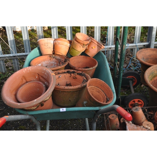 6 - A COLLECTION OF VINTAGE AND MODERN TERRACOTTA PLANT POTS,  the largest being 45cm in diameter, a whe... 