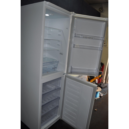 73 - A BEKO CFG3682W FRIDGE FREEZER width 55cm, depth 60cm, height 181cm (PAT pass and working at 3 and -... 