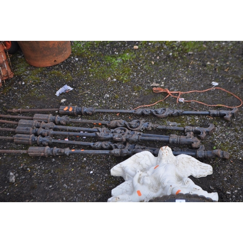 8 - A COLLECTION OF CAST AND WROUGHT IRON GARDEN ITEMS, including six early 20th century posts with foli... 