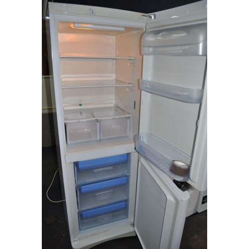 84 - AN INDESIT BAAN 12 FRIDGE FREEZER width 60cm, depth 66cm, height 175cm (PAT pass and working at 4 an... 