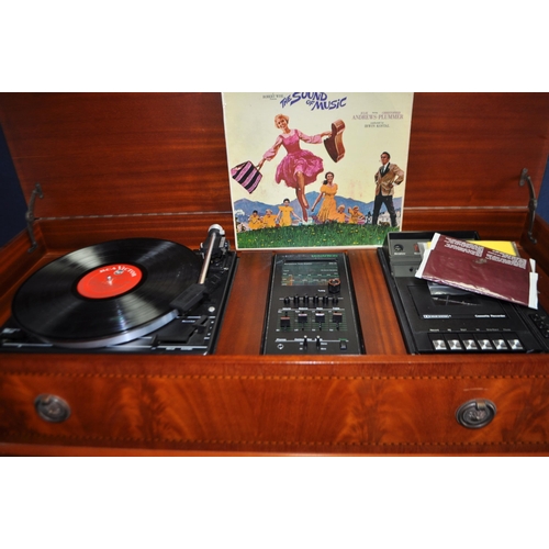 85 - A DYNATRON GC1010 MUSIC CENTRE in a mahogany cabinet with a Garrard 35SB turntable (PAT pass and wor... 