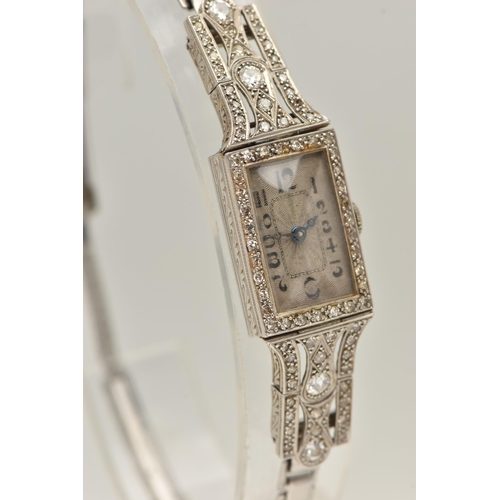 418 - A WHITE METAL DIAMOND SET COCKTAIL WATCH, manual wind, rectangular silvered dial (discoloured), Arab... 