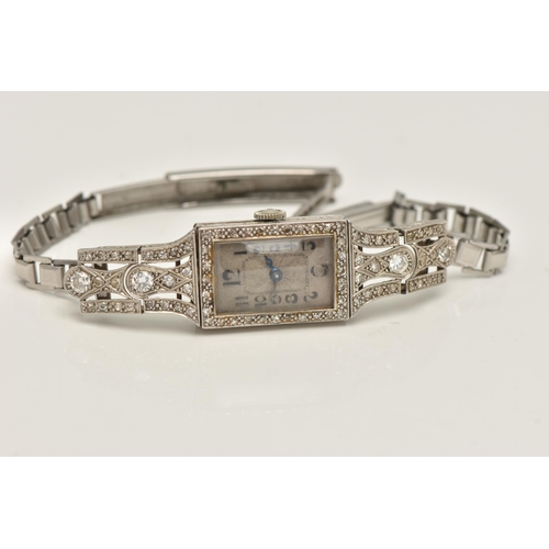 418 - A WHITE METAL DIAMOND SET COCKTAIL WATCH, manual wind, rectangular silvered dial (discoloured), Arab... 